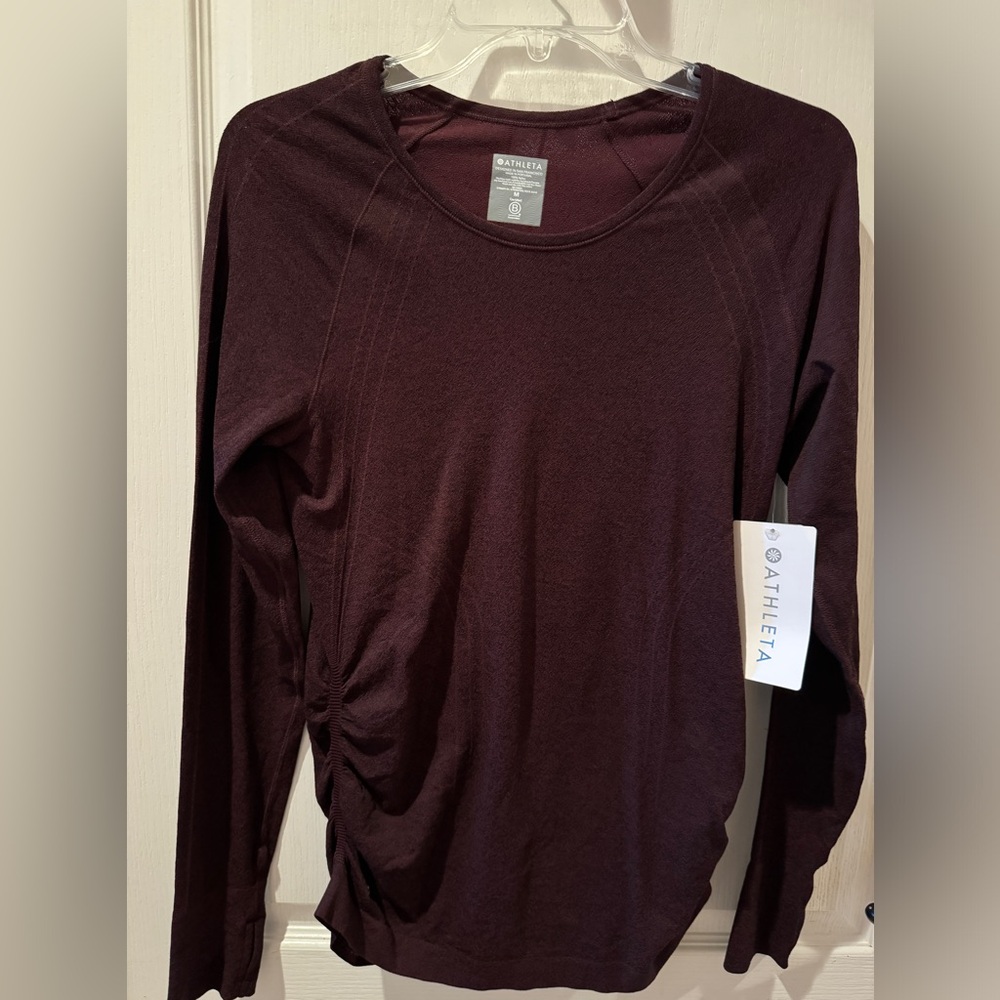 ATHLETA woman’s speed light tethered top size medium in antique burgundy
